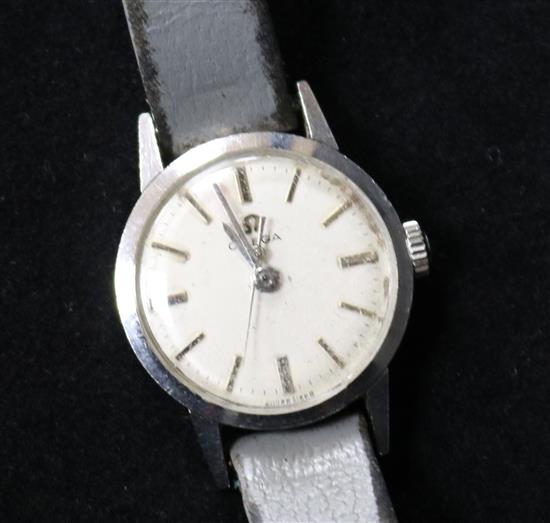 A ladys early 1960s steel Omega manual wind wrist watch.